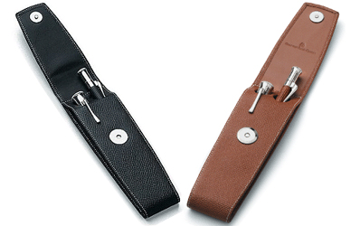 Black and brown leather pen cases for two pens.